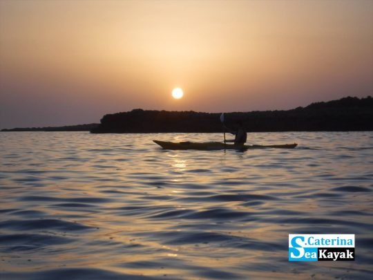 Kayak Porto Selvaggio - tramonto in navigazione